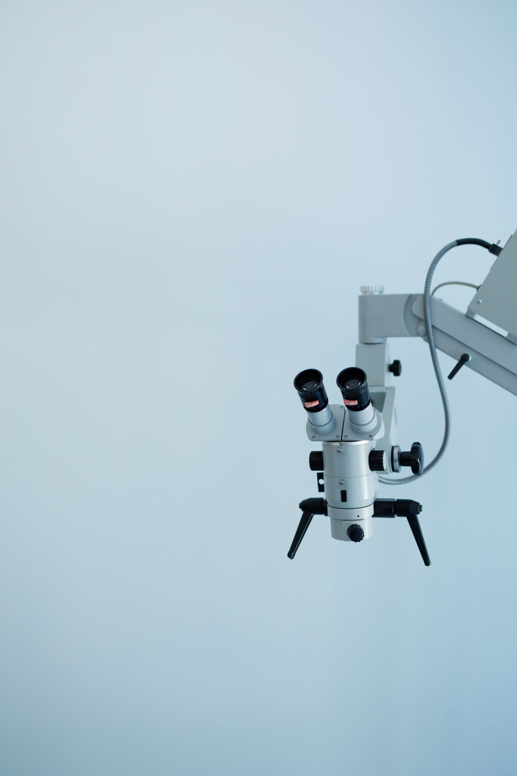 vertical image of a microscope for dental treatment